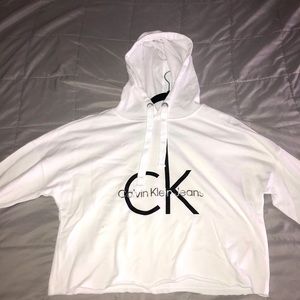 Calvin Klein cropped sweater. Never been worn, tag still on.